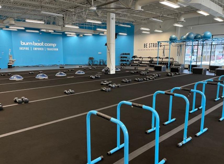 Interior of Burn Boot Camp gym in Atlanta with clean rubber flooring, professionally maintained by Zerorez Commercial after hours.